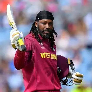 LEEDS, ENGLAND - JULY 04: Chris Gayle of West Indies acknowledges the crowd as he walks off after being dismissed by Dawlat Zadran of Afghanistan during the Group Stage match of the ICC Cricket World Cup 2019 between Afghanistan and West Indies at Headingley on July 04, 2019 in Leeds, England. (Photo by Clive Mason/Getty Images)